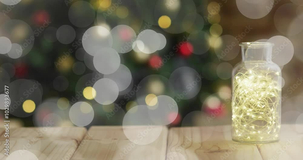 Poster glowing fairy lights in jar with bokeh lights animation in background