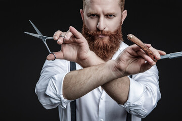 Man barber making a haircut in a barbershop. Great time at barbershop. Haircut by hairdresser at barbershop. Barber man. Man barber with razor blade do haircut. Professional skills