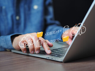 Data transfer concept. Businessman sending file transfer, backup, and download documents online....