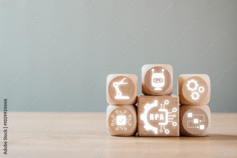 Poster wooden blocks with icons symbolize robotic process automation, showcasing technology and innovation 