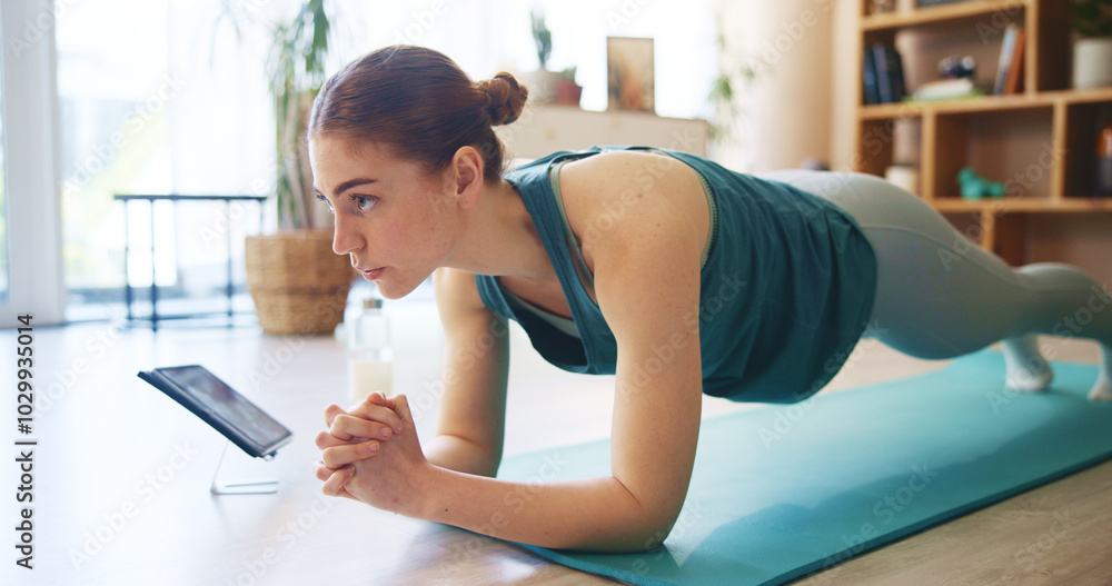 Wall mural Fitness, plank and woman on tablet in home for wellness, healthy body and workout for online class. Pilates, yoga and person on floor on digital tech for exercise, training and video tutorial