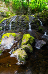 The main Fairy Falls Rhaeadr y Tylwyth Teg in Welsh, in the village of Trefriw. Low in Summer.