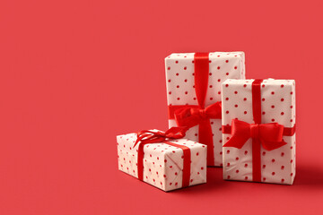 Christmas gift boxes on red background