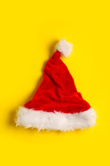 Santa Claus hat on yellow background