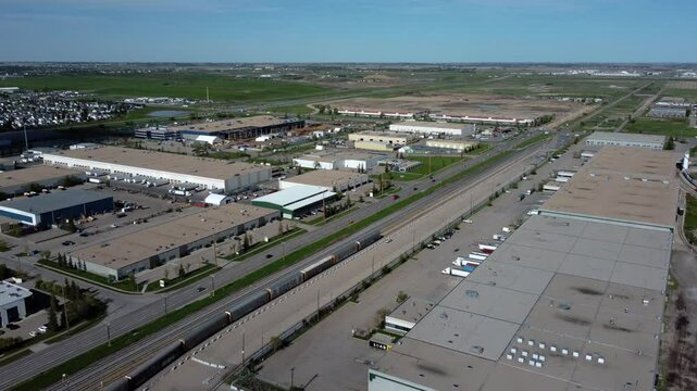 Long train in Western Canada from an aerial view.