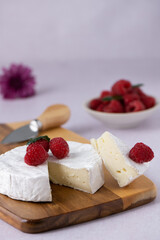 Brie cheese on a charcuterie board