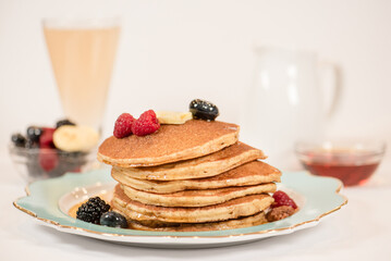 Breakfast meal including pancakes and berries