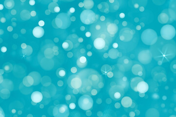 Blue light christmas background with white defocused sparkles