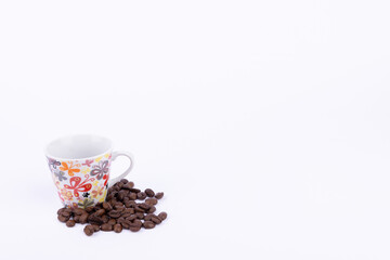 Inviting Coffee Setup with Coffee Cup and Beans on a White Background