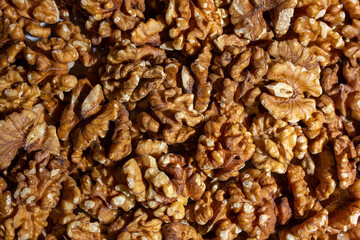 Scattered Shelled Walnuts. Background from Walnut. Natural High-Calorie Snacks