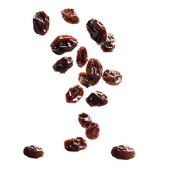 Obraz premium Dried Fruit Raisins Falling Against Black Background