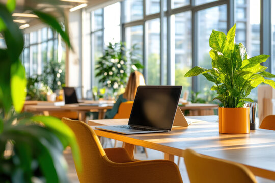 An Entrepreneur Working In A Modern Co-Working Space, Using A Laptop And Smart Devices To Connect With Clients Globally, Illustrating The Integration Of Technology In Business