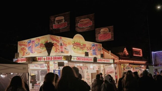 Travelling fair. Street food and people. 