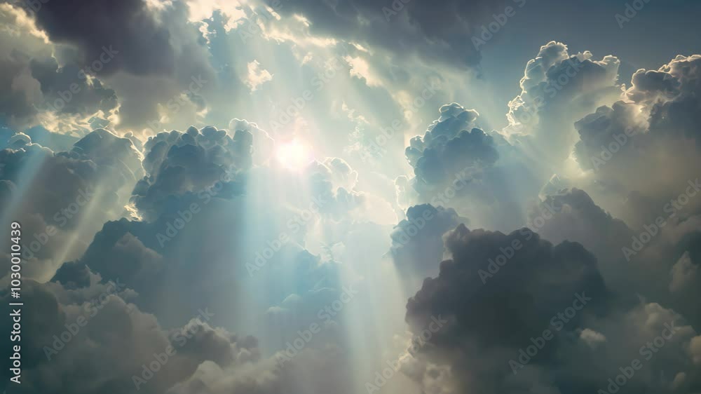 Poster sunbeams pierce through a dense layer of clouds, creating a dramatic and ethereal glow in the early 