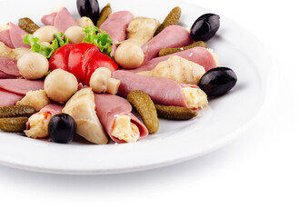Meat rolls with cheese decorated with mushrooms on white plate