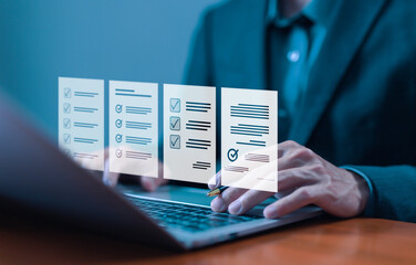 task audit in a list of documents, tick the checkmark in the survey item on a laptop. checklist...