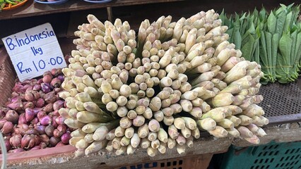 Fresh and raw vegetables the market. Fresh potatoes, bel peppers, tomatoes, zucchini, eggplant and green beans for sale at vegetable market, close up. Organic vegetables at local market.