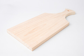 Close-up photo of Wooden cutting board isolated on white background.