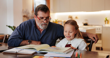 Teaching, reading and homework with grandfather and child for education, support and school project. Learning, knowledge and books with senior man and girl in family home for academic tutor