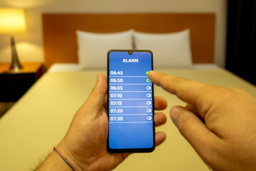 Alarm setup on smartphone screen. Sleep pattern and Alarm message. 