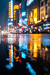Naklejka premium City road reflects vibrant neon lights on wet pavement during rainy night.