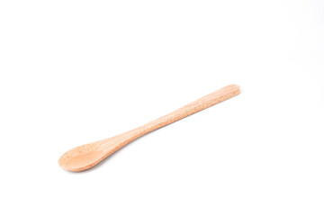 Close-up photo of wooden long teaspoon isolated on white background. Shot on 30 Degree angle setup.