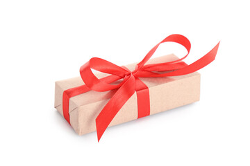 Christmas gift box with red ribbon on white background