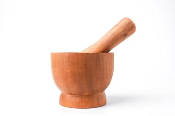 Close-up photo of Wooden mortar and pestle isolated on white background. Shot on Eye-level degree angle setup.