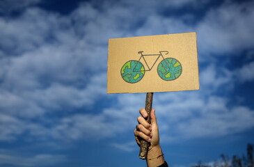 Hands and placards raised to the sky during the Global Climate Strike. 