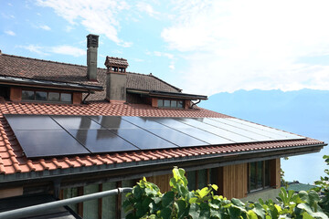 Photovoltaic panels on the roof of the house.