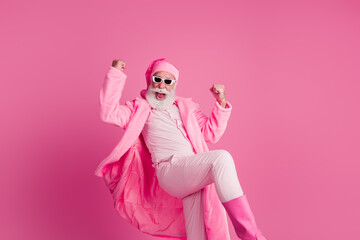 Photo of cheerful funny senior man wear trendy bright coat celebrate valentine date sale isolated on pink color background