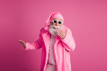 Portrait of cheerful funky grandfather cover mouth giggle wear christmas bathrobe hat isolated on...