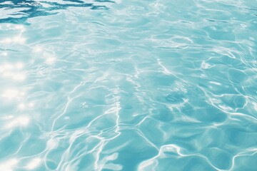 Gentle light dances on the soft rippling surface of tranquil water in a serene environment