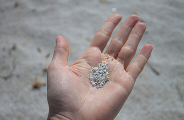 sand in hand