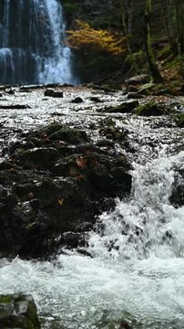 Vertical shot of cascading waterfalls in an autumn forest, Josefsthaler Wasserf&auml;lle