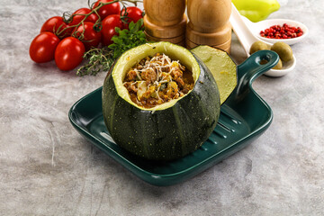 Baked round zucchini with meat