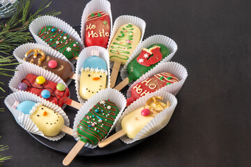 Christmas funny kids food. Cheesecake ice cream winter. Candy snowman, deer. Gingerbread cookie