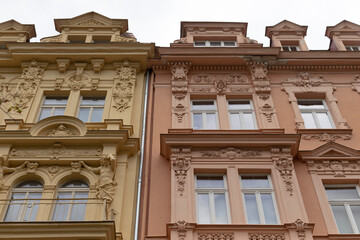 A beautifully designed building that features a balcony elegantly situated on the side, adding charm and character to its overall appearance