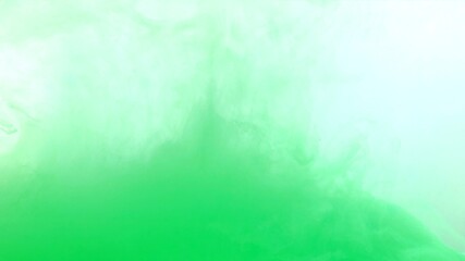 Green color dye melt on white background,Abstract smoke pattern,Colored liquid dye,Splash pain