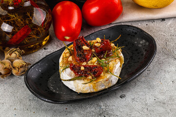 Baked camembert cheese with honey