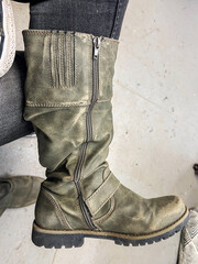 Close-up of Worn Green Combat Style Boot
