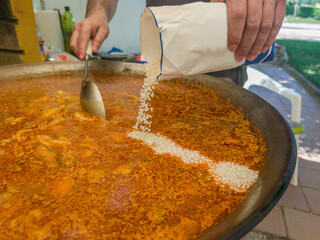 Preparation of mixed valencian paella