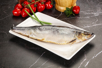 Whole raw salted herring fish
