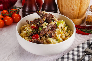 Traditional couscous with beef and vegetables