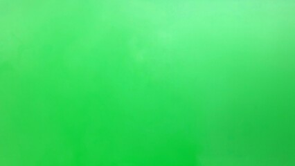 Green color dye melt on white background,Abstract smoke pattern,Colored liquid dye,Splash pain