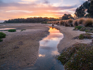 Sunset Reflections on the Tidal Flat