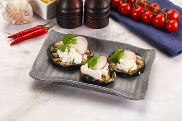 Grilled eggplant with cheese and radish