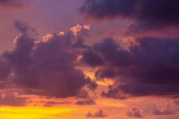 Vibrant sunset sky with dramatic clouds, backgrounds and nature themes.