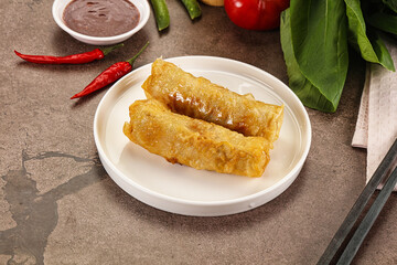 Vietnamese stuffed spring roll served sauce