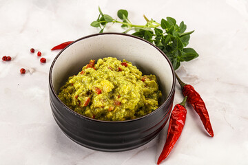 Guacamole with avocado, tomato and chili
